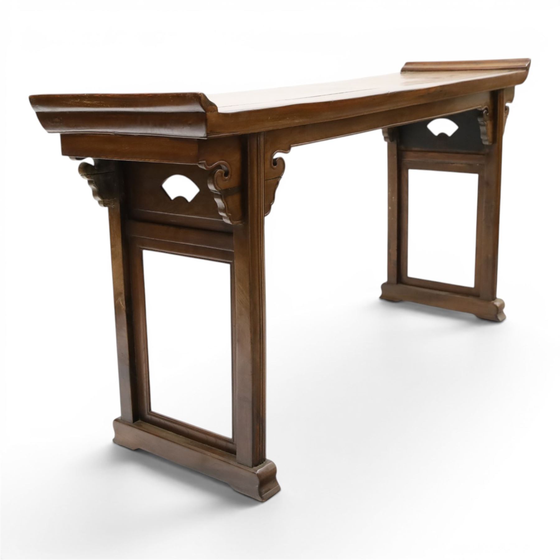 Chinese elm altar table, rectangular plank top with galleried sides, raised on reeded square supports with scrolled spandrels