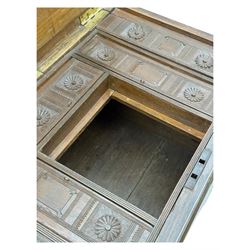 Zanzibar chest, early 20th century, of hardwood construction with brass inlaid foliate and geometric decoration to the lid, fitted interior of multiple carved compartments, with brass strapwork, side handles, and shaped bracket feet