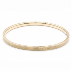 Early 20th century 9ct gold arm bangle, with engine turned decoration by Deakin & Francis ...