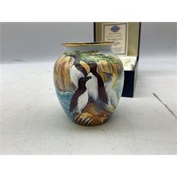 Limited edition Moorcroft enamel vase, decorated in the Lundy Island pattern, with certificate signed by the artists, no 58/75, in fitted box
