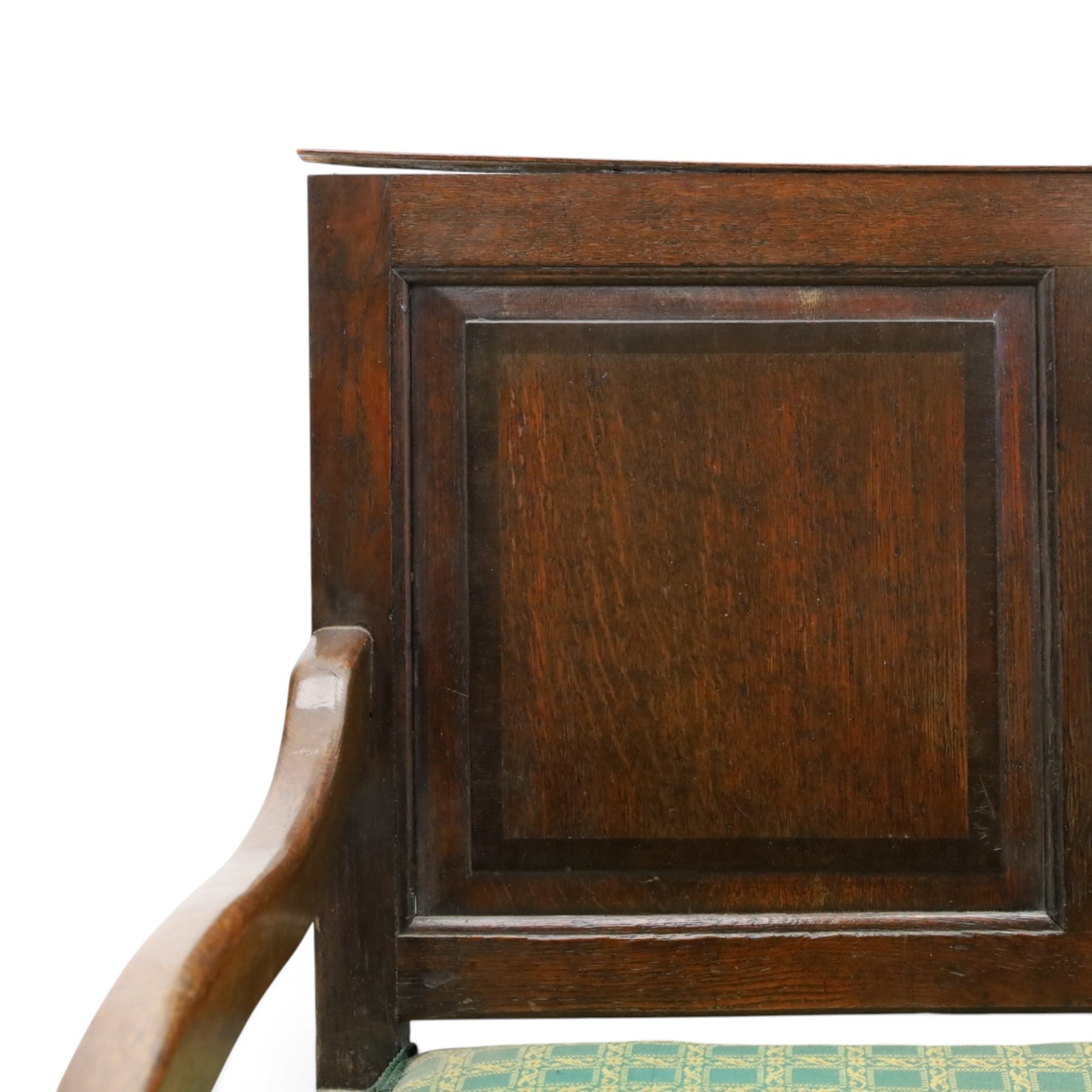 17th century design oak four panelled hall bench, fielded back panels flanked by swept arms on turned supports, raised on six supports united by a stretcher