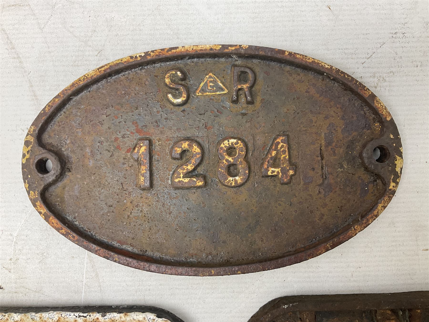 'LNER, 21 tons, 1947, Darlington, 302871' cast iron sign, together with BR D type Wagon plate, 'B426424 Hurst Nelson 1957 Lot No 3035' and another cast iron plaque