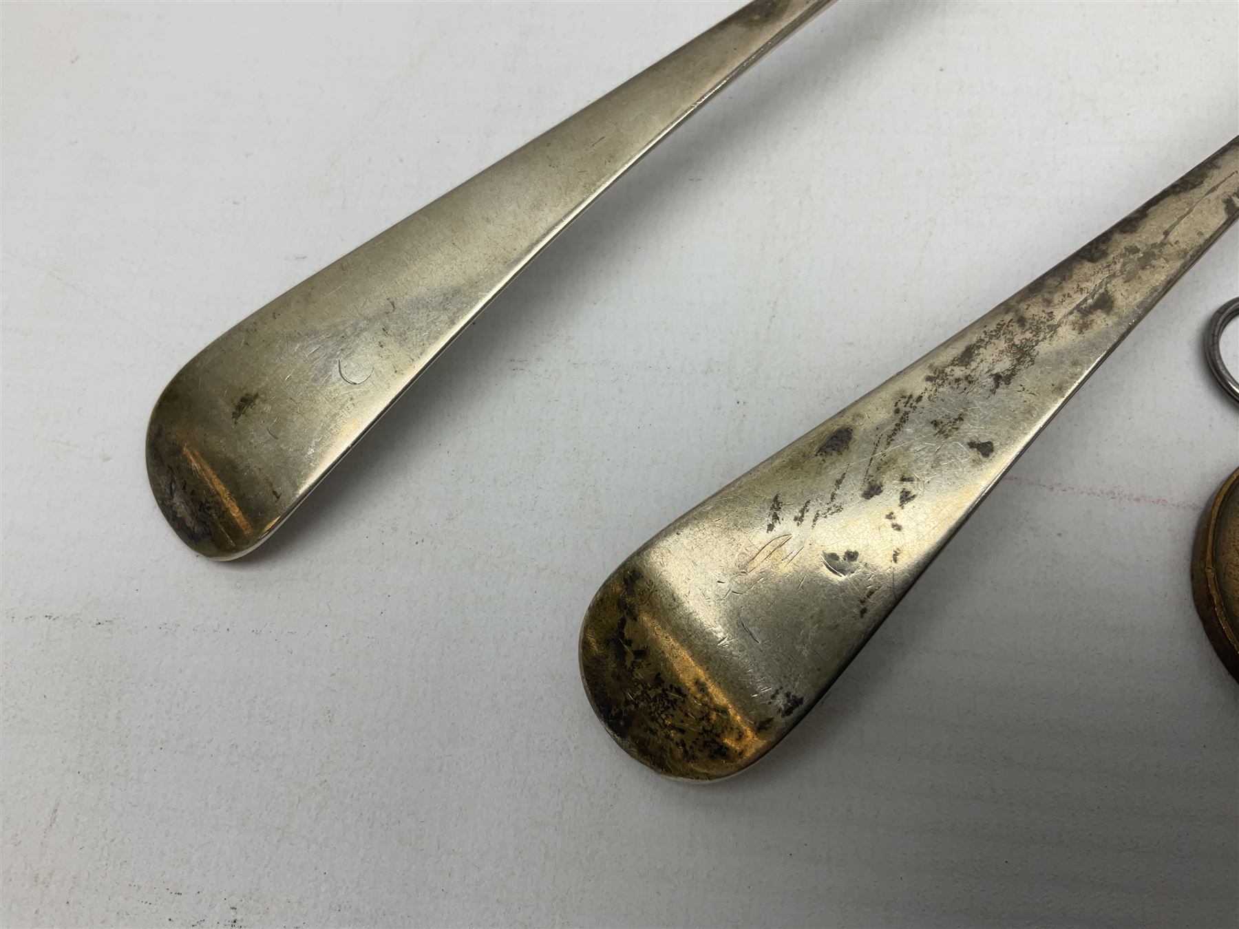 Two silver Georgian tablespoons, approximate total weight 3.36 ozt (104.7 grams), together with Great War Peace Medal 1919 and two others 