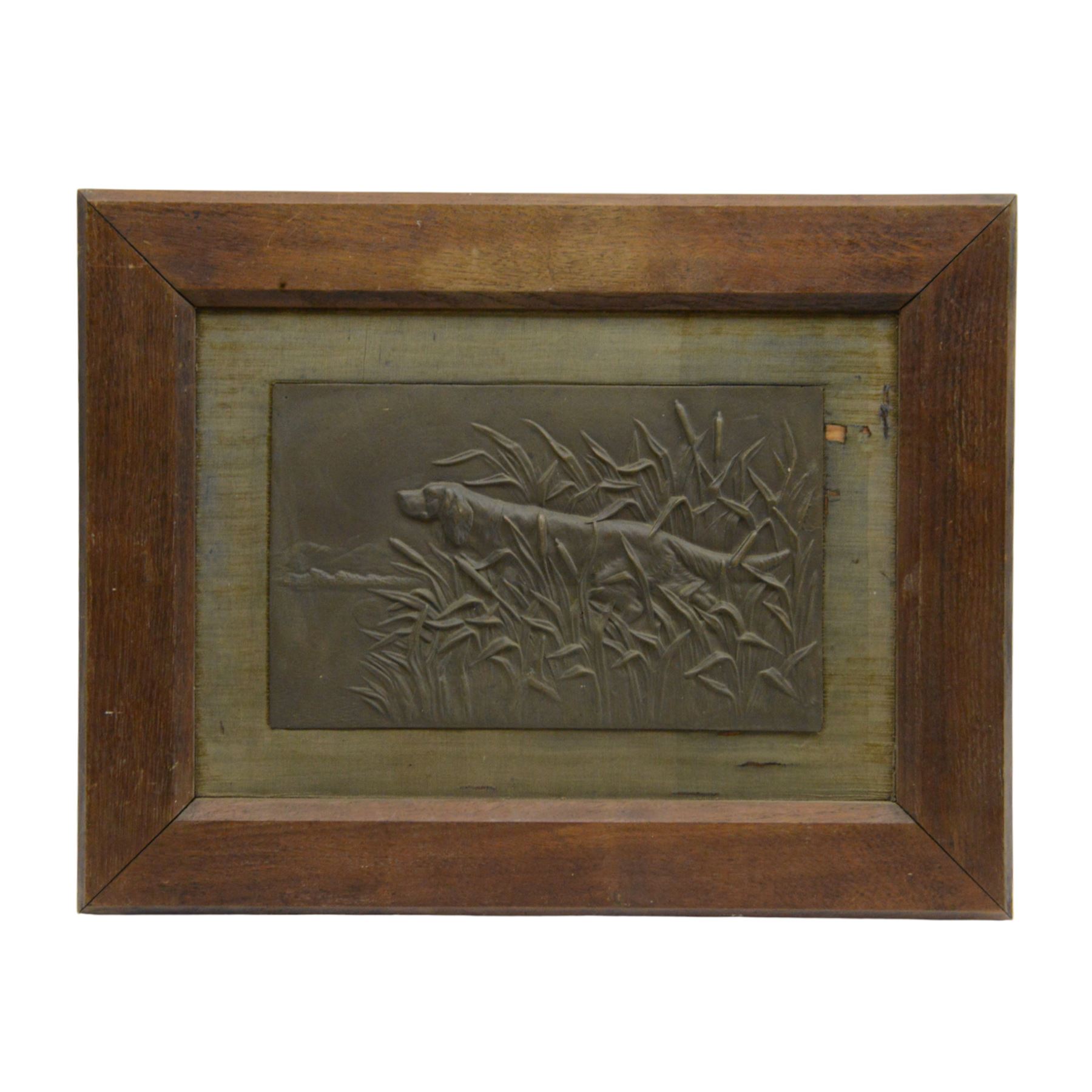 After Barye, bronze plaque cast in relief, depicting a hunting dog amongst reeds, within a wooden frame, H46cm, L60cm   