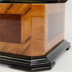 Reuge Sainte-Croix- 21st century Swiss musical box with a highly polished lacquered finish, inlaid and ebonised case with a glazed internal viewing lid, polished steel 144 teeth two-part comb playing three arias from The Phantom of the Opera by Lloyd Webber, with tune indicator and tune sheet.