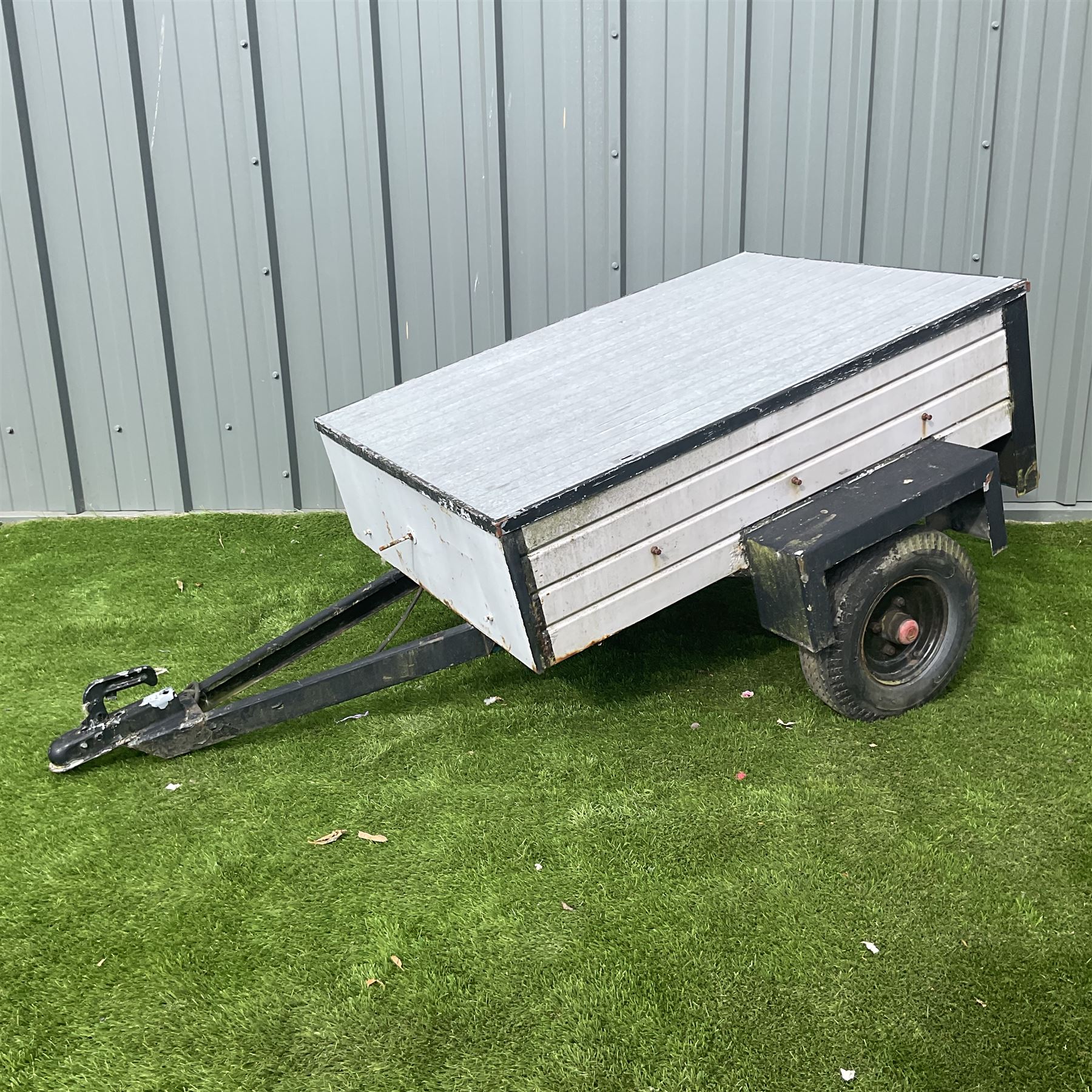 Small trailer with removable metal lid and spare wheel  - THIS LOT IS TO BE COLLECTED BY APPOINTMENT FROM DUGGLEBY STORAGE, GREAT HILL, EASTFIELD, SCARBOROUGH, YO11 3TX