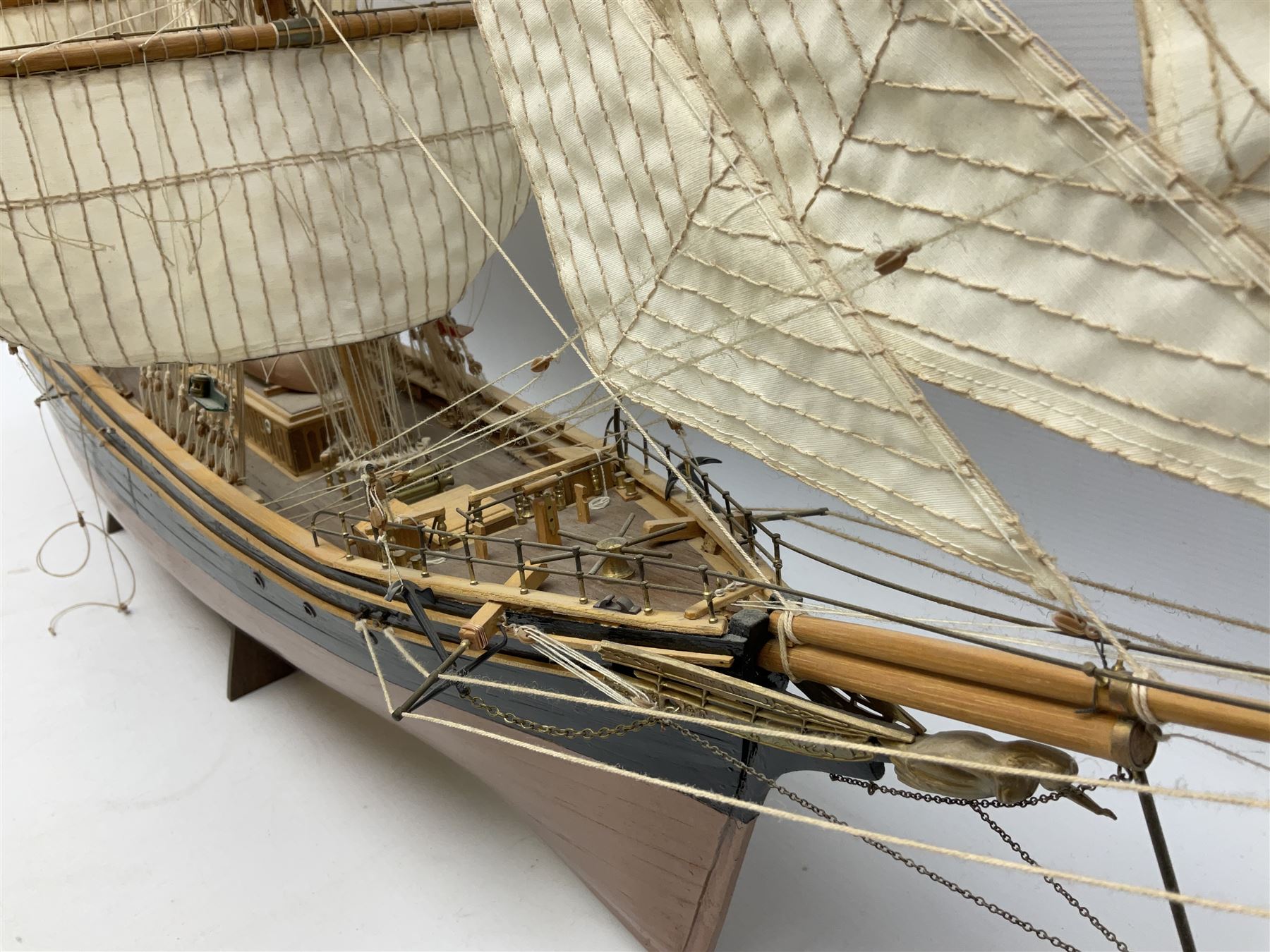 Three masted kit built sailing ship with cloth sales, deck fittings and full rigging, on open display, L110cm, H80cm  