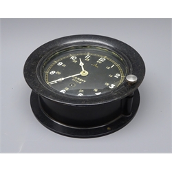  US Navy bulkhead timepiece, 24 hour circular dial with luminous numerals No.3470-E, Bakelite case with convex glass door, D19.5cm   
