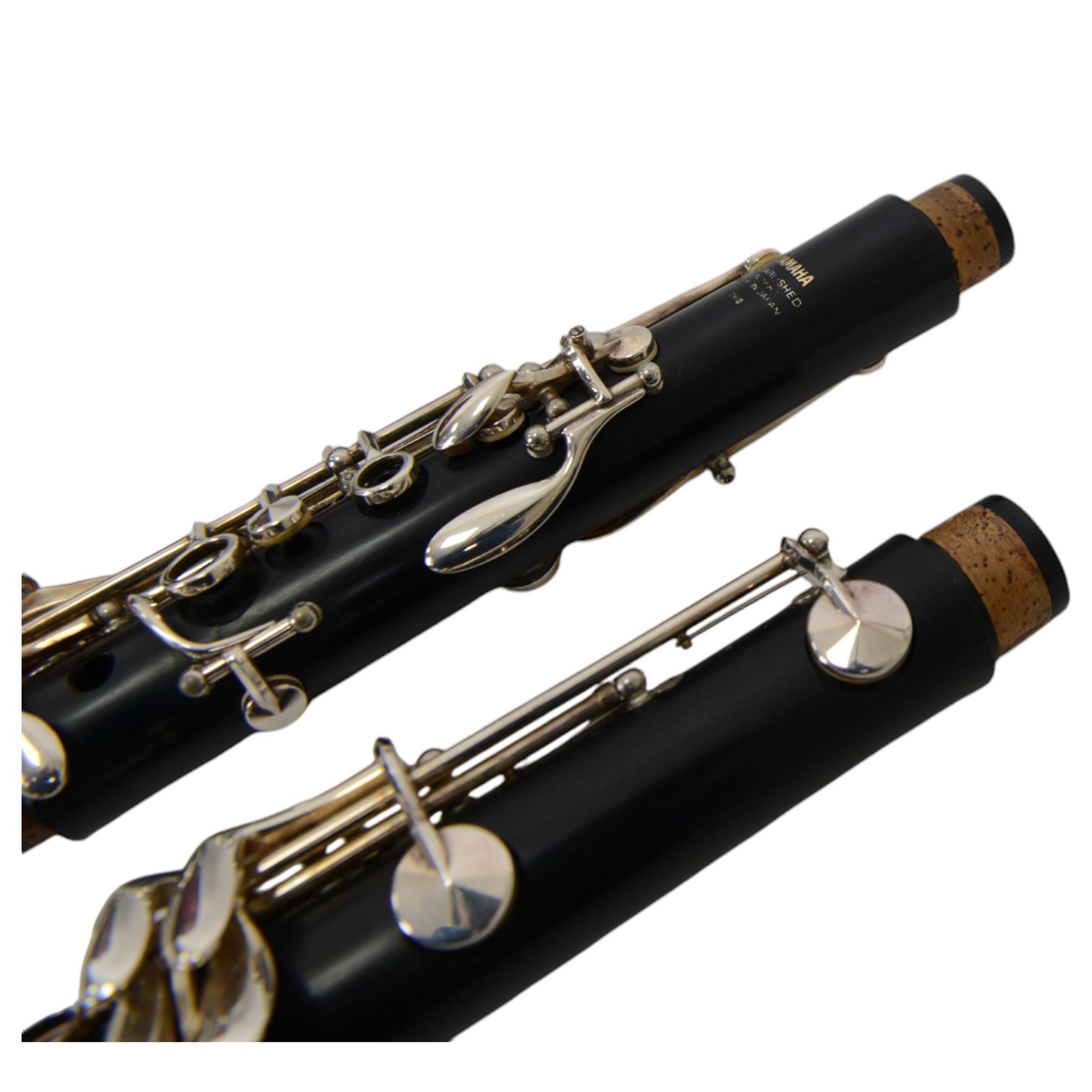 Yamaha 26 student clarinet, with a resin body and chrome keys, in a velvet lined and padded hard case.