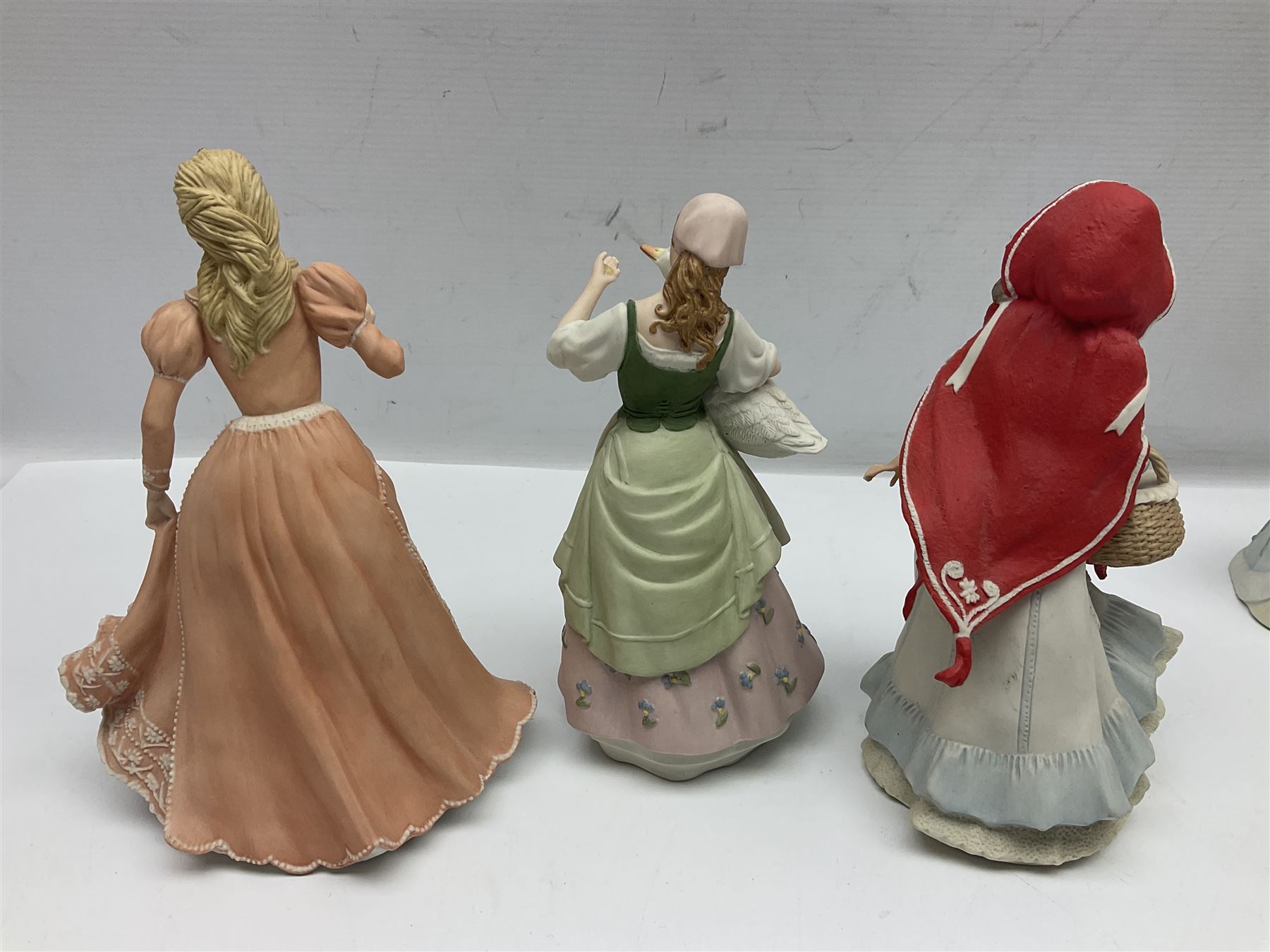Collection of six Wedgwood Danbury Mint fairy tale figures, comprising Cinderella, Red Riding Hood, Little Bo Peep, Mary had a Little Lamb, Goose Girl and Rapunzel