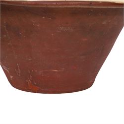 19th century pancheon, of tapering circular form, the glazed interior with slip decoration H20cm, D42cm 