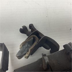 Late 18th/early 19th century flintlock tinder lighter, the steel box lock with hinged door to the left side, fruitwood butt with plain bar trigger, the left side set with a taper sconce and bipod front support, L21cm.