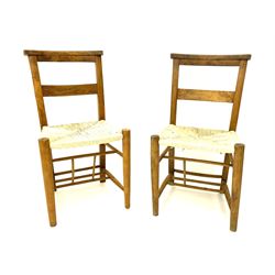 Pair early 20th century beech and elm chapel chairs with rush seats 