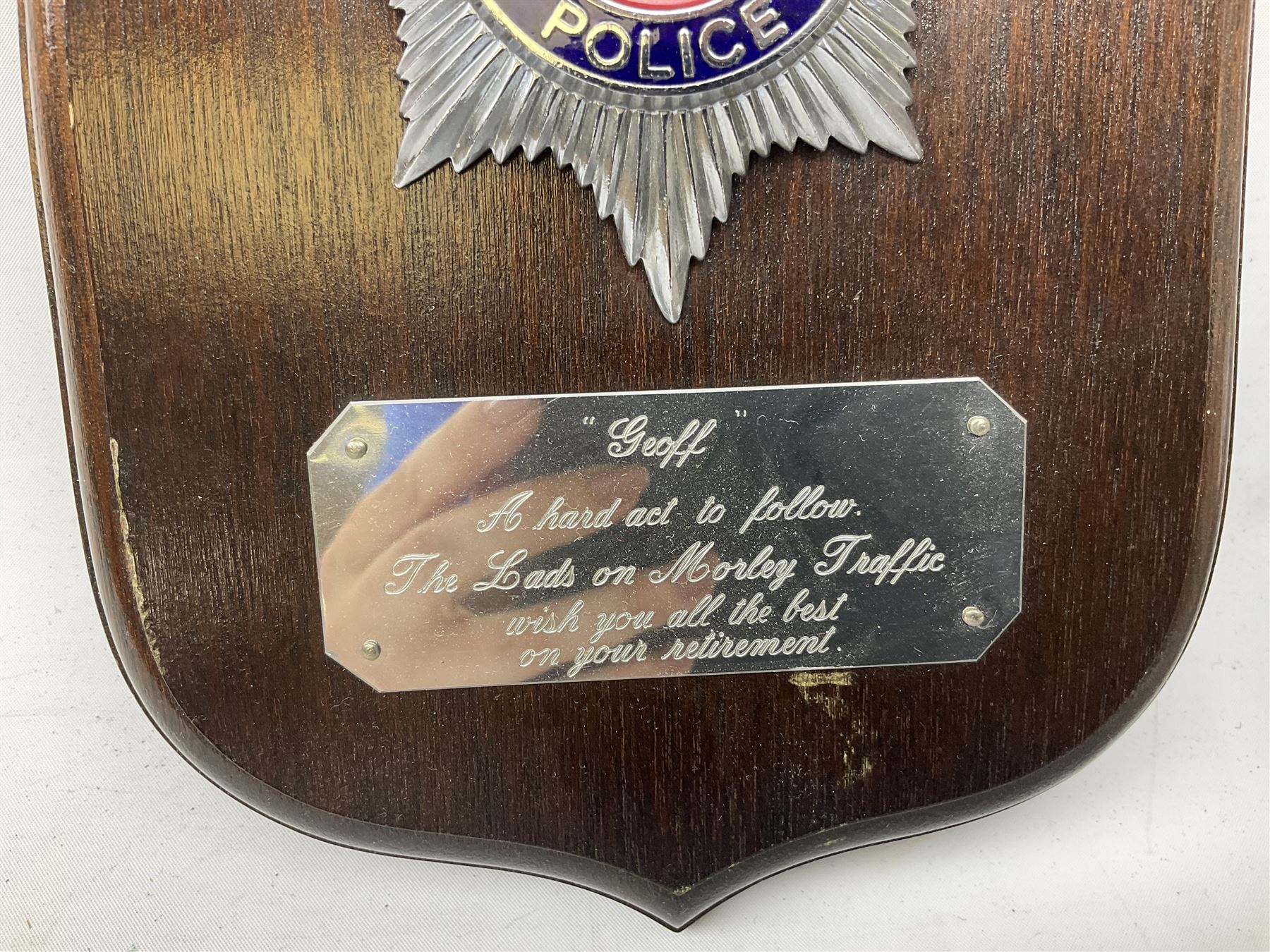 Archive of memorabilia and ephemera relating to Pc. (later Sgt.) Geoffrey Robinson of Dewsbury (later West Yorkshire) police force including cased Long Service and Good Conduct Medal; helmet plates and cap badges, collar numbers and uniform buttons, whistles, certificates, photographs, plaque etc 1960s - 1990s