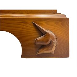 Unicornman - yew wood cabinet, moulded hinged lid over two panelled doors and shelves (W56cm, H99cm, D45cm); and four Unicorn man CD racks two in yew wood and two in oak (W20cm, H36cm, D20cm); all carved with unicorn signature and by Geoff Gell, Coxwold
