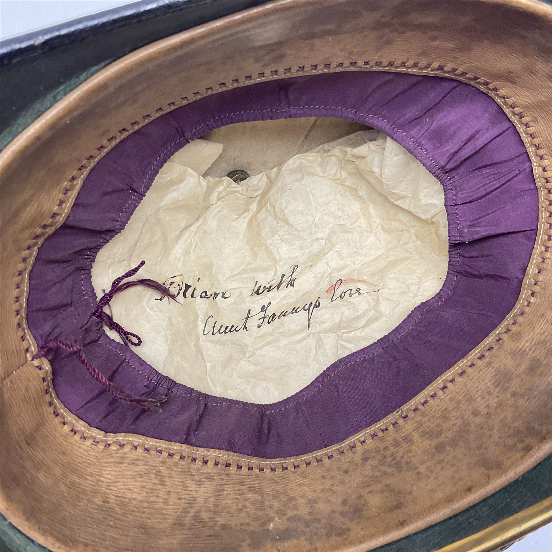 Late Victorian North Staffordshire Regiment Officer's Home Service Blue Cloth Helmet, having incorrect other ranks gilt metal Queen's crown helmet plate to the front with later leather backing, removable spike to the top on a shaped cruciform base with rosette fittings, rosette side bosses, brass trim to the front peak, and leather and velvet backed chin scales, with leather sweat band, the interior with makers stamp for Hawkes & Co 14 Piccadilly London