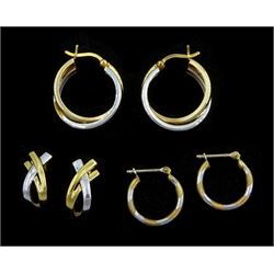 Two pairs of white and yellow gold hoop earrings and a pair of white and yellow gold crossover earrings, all 9ct