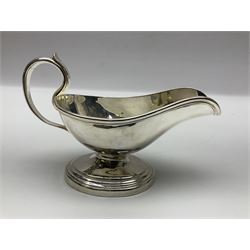 Christofle silver-plated sauce boat, of typical plain form, with capped C scroll handle and engraved anchor crest to body, upon a stepped oval foot, stamped 22 Christofle to base, including handle H14cm