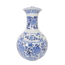 Oriental style blue and white table lamp, with cream shade, H43cm
