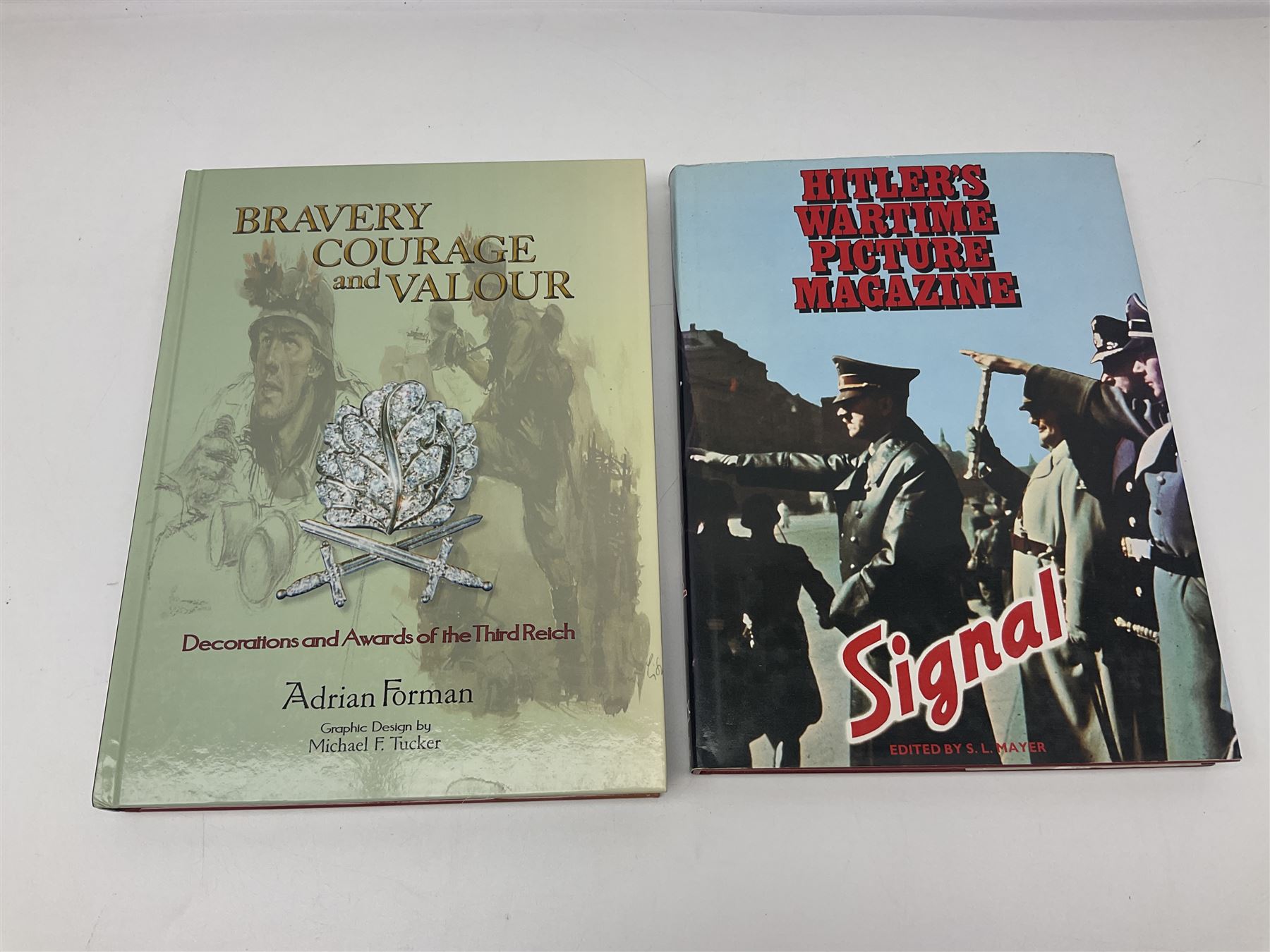 Excellent collection of twelve German Third Reich reference books including four by Adrian Forman - Guide to Third Reich German Awards and Documents, ........ Documents and Their Values. Volumes one and two. Both limited edition and signed by the author; and Bravery, Courage & Valour - Decorations and Awards of the Third Reich; D.E. Bowen: The Prussian & German iron Cross. Signed by the author; Ulric of England: Collecting Third Reich 'SS' and Political Cuffbands. Two volumes; Don Boyle: 'SS' Totenkopf H. Himmler Ring 1933-1945. 2nd printing. Signed by the author and inscribed to 'Adrian' (Forman); and four others (12)