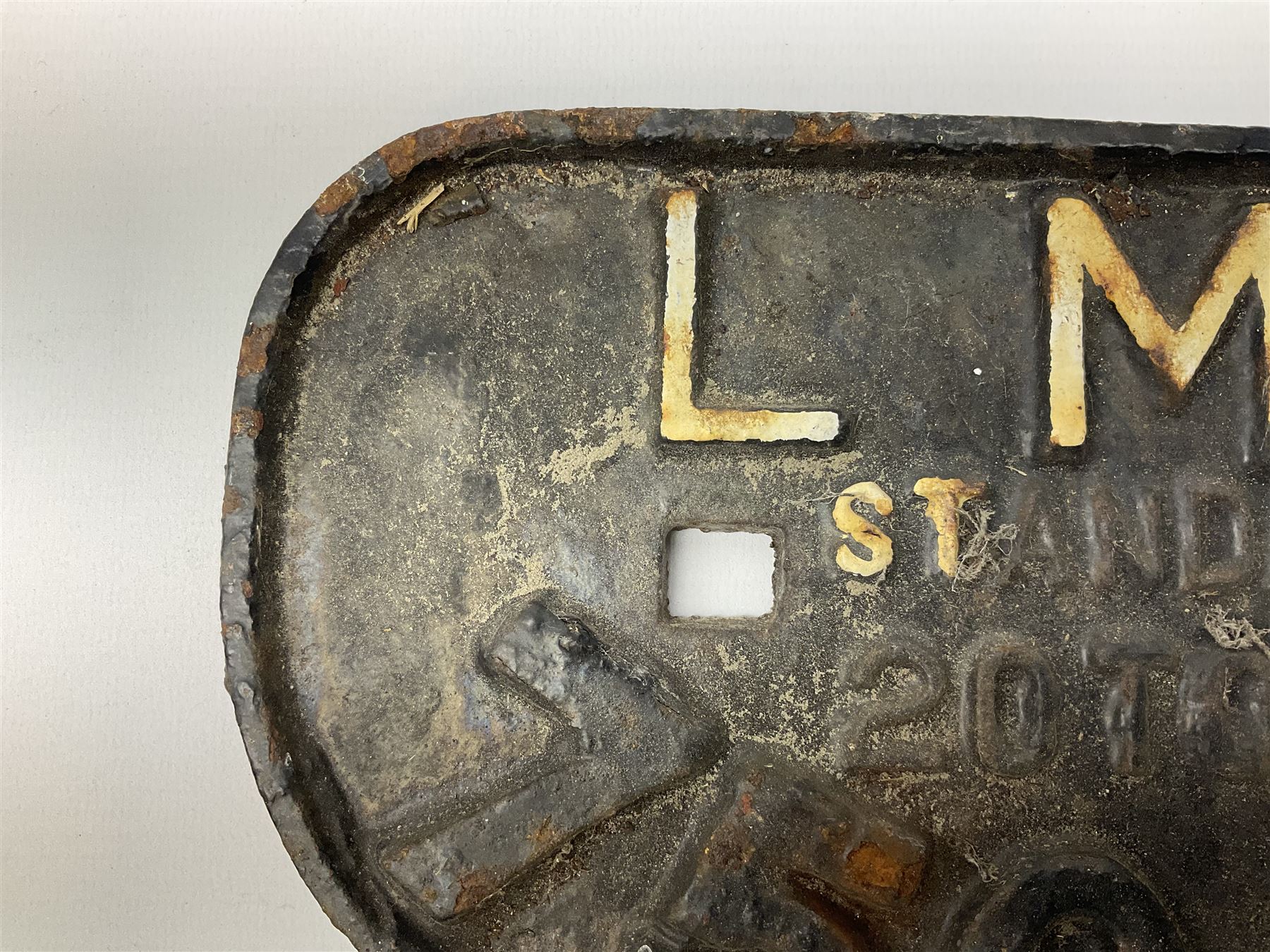 Three cast iron railway wagon plates of D shaped form to include Southern Railway, LMS and GWR, L27.5cm