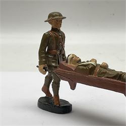 Eight Elastolin British soldiers and wartime figures, including nurse, injured soldier on stretcher, soldier with dog, etc, tallest 11cm