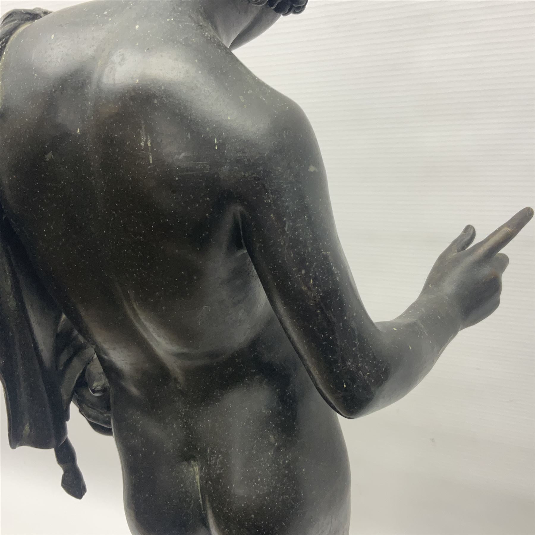 Bronzed classical nude male figure, upon a stepped circular base, H61cm 