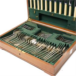 Canteen of silver plated cutlery for six covers by Cobb & Co with bone handled knives marked Ogden, Harrogate in mahogany box, 52 pieces