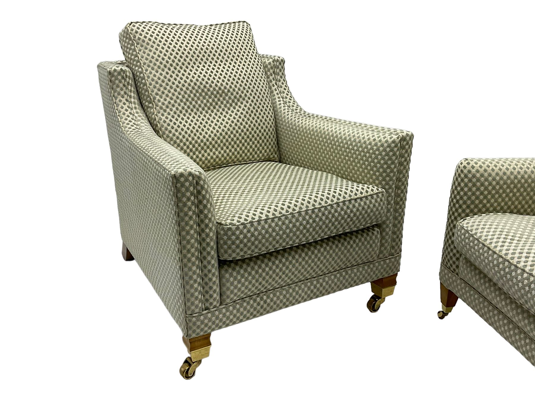 Three-piece hardwood-framed lounge suite - large two-seat Knole sofa with drop ends, upholstered in patterned fabric decorated with urns and foliage (W190cm, D117cm, H88cm); armchair upholstered in contrasting geometric pattern fabric (W83cm, D102cm, H93cm); and another armchair (W82cm, D102cm, H92cm) (3)