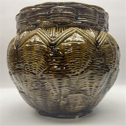 Burmantoft pottery jardiniere, moulded with basket weave decoration, upon a brown ground, with impressed mark beneath H24cm 
