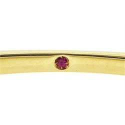 Roberto Coin 'Parisienne' 18ct gold three row round brilliant cut diamond bangle, with a signature round cut ruby to the underside and ruby set clasp, Birmingham 2006, boxed