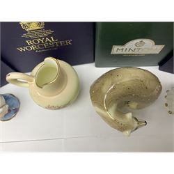 Two Royal Worcester candle snuffers from the connoisseur collection, comprising of Baby and Toby, together with Minton Fawn on Ivory Polar Bear and one other, all with original boxes 