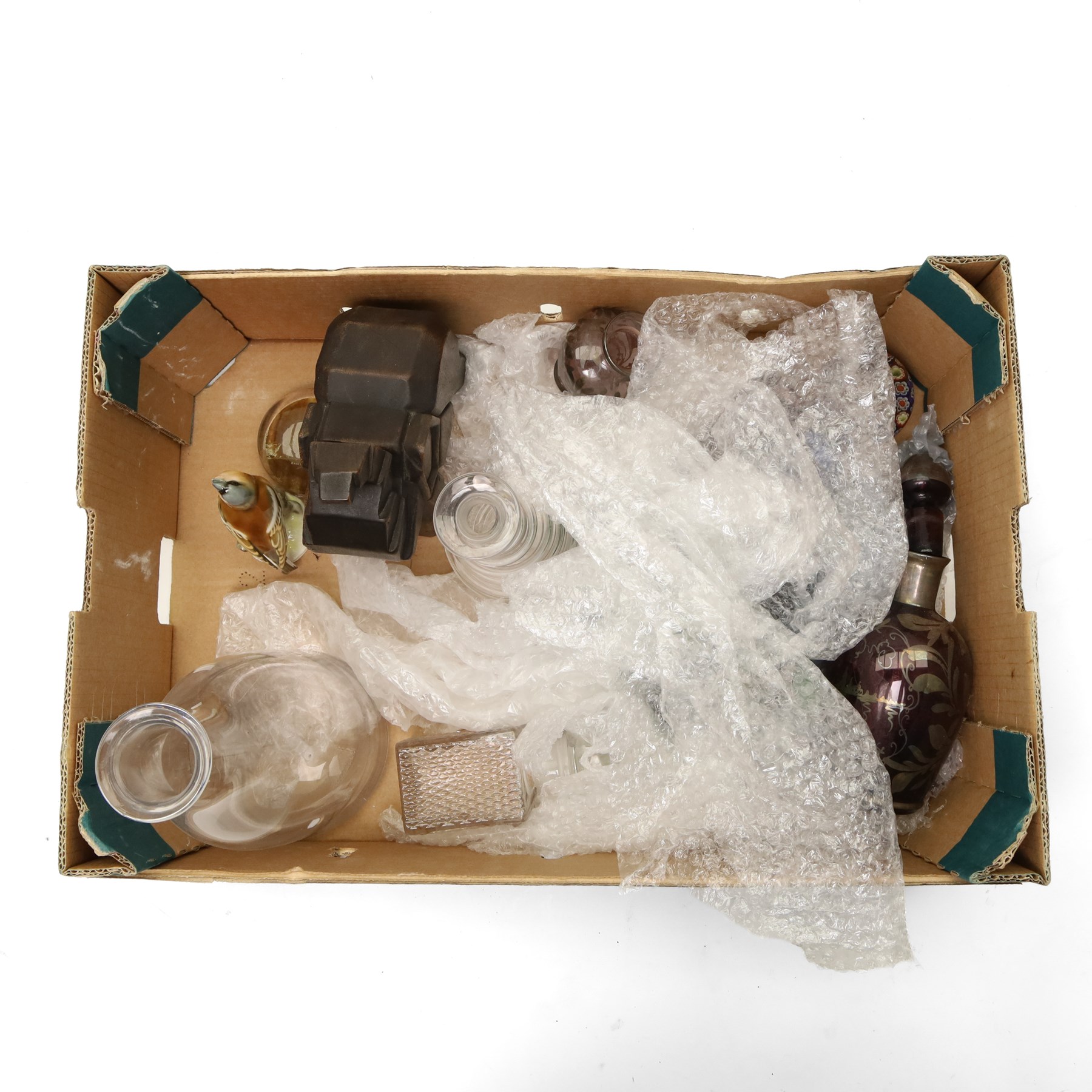 Box of miscellaneous items including coloured glass liqueur decanter and tots, two paperweights, glass carafe etc