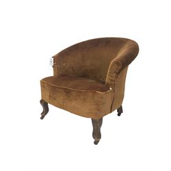 Early 20th century tub shaped armchair, upholstered in chocolate brown velvet fabric with sprung seat, raised on cabriole supports with castors
