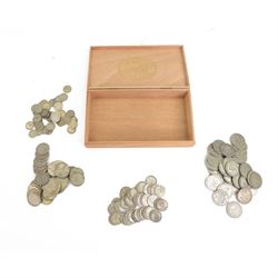 Approximately 1250 grams of Great British pre-1947 silver coins, in a wooden cigar box