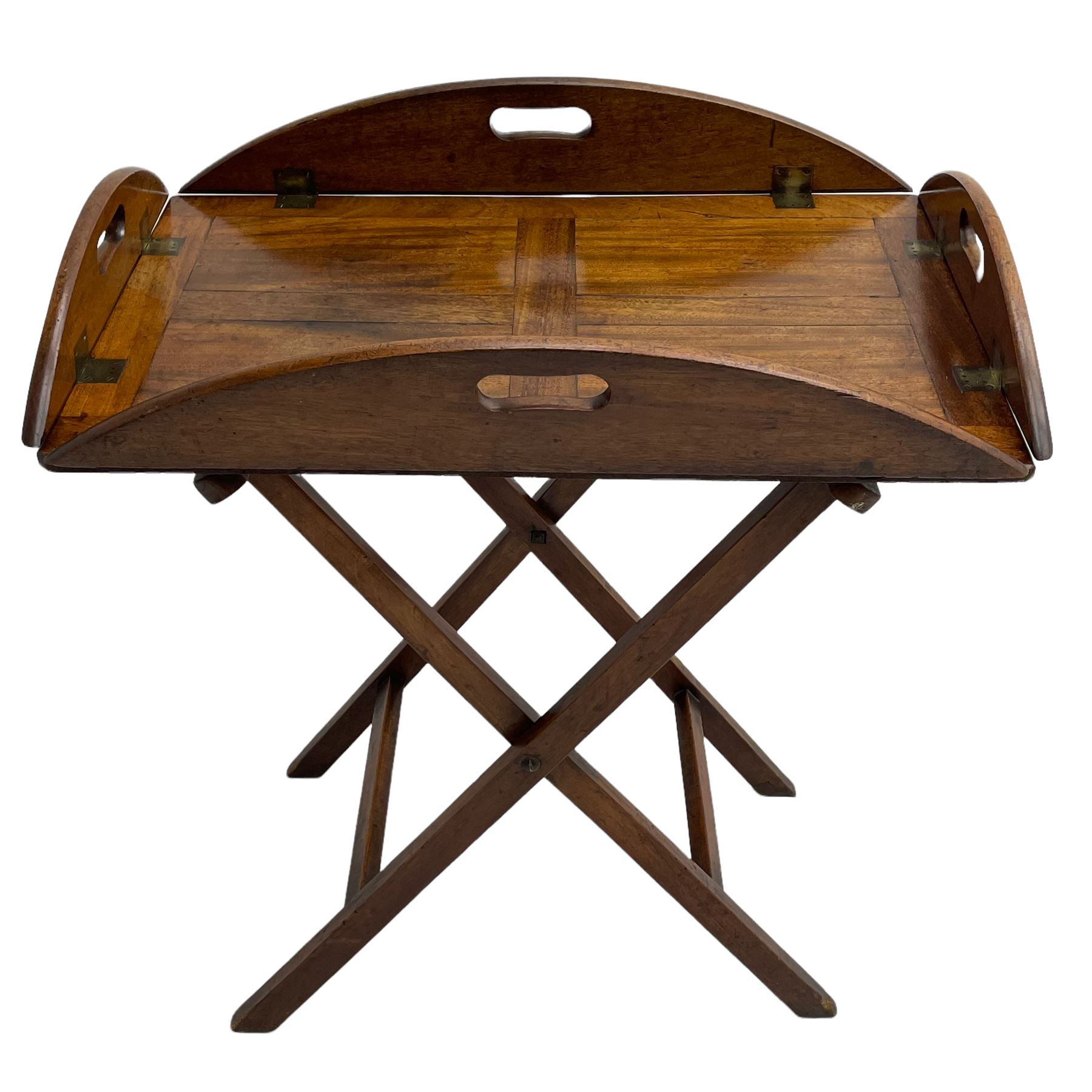 George III mahogany butler's tray on stand, the panelled tray with hinged sides pierced with handles, on folding stand