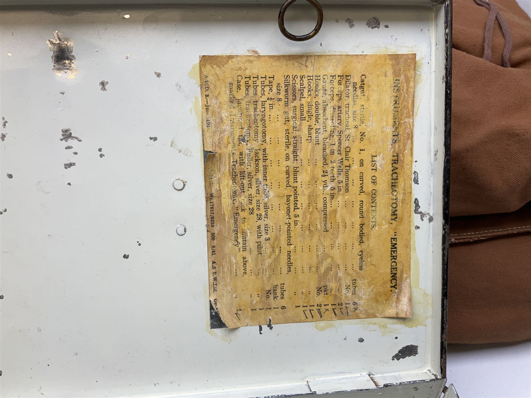 WW2 British Army RAMC 'Regimental Medical Pannier', well marked externally and dated 1941, stamped May 1943 internally, canvas covered wicker form with leather edges, hinged top and fall front with two rope carrying handles, fitted iron locking straps with securing chains; contains various unused field dressings and bandages with WW2 dates and two pillows; original label under lid L79cm