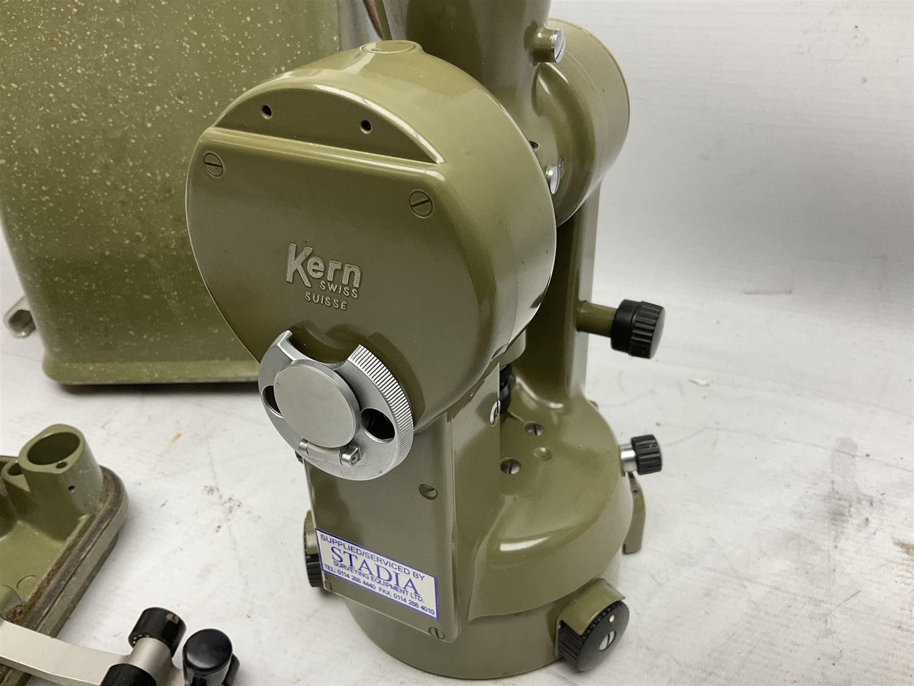 Swiss Kern K1-RA engineer's self-reducing tachymeter theodolite, serial no.197914, with metal cover; Hilger & Watts Ltd. theodolite, serial no.114671, with tool set and metal over; Cooke Troughton & Simms Ltd. tilting level, serial no.SO377O3; uncased; and mahogany hinged  measuring staff (4)