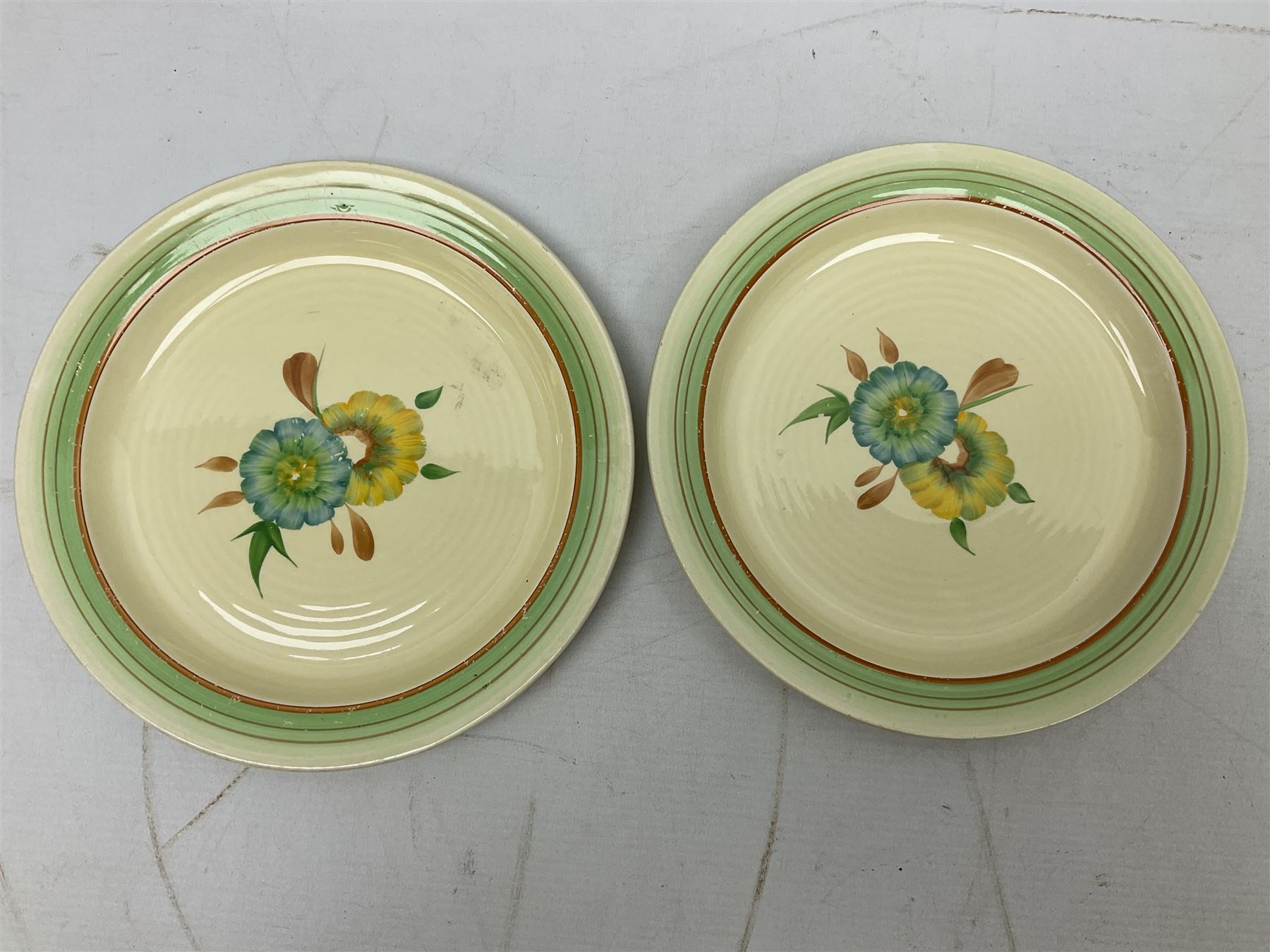 Wilkinson Clarice Cliff honeydew pattern tea service for eight, comprising teapot, milk jug, open sucrier, teacup and saucers, dessert plates and two side plates (29)