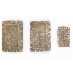  Two Japanese silver 'Tenpo Ichibugin'/'Old Ichibugin' both weighing approximately 8.66 grams and a silver 'Isshuban' weighing approximately 1.84 grams  