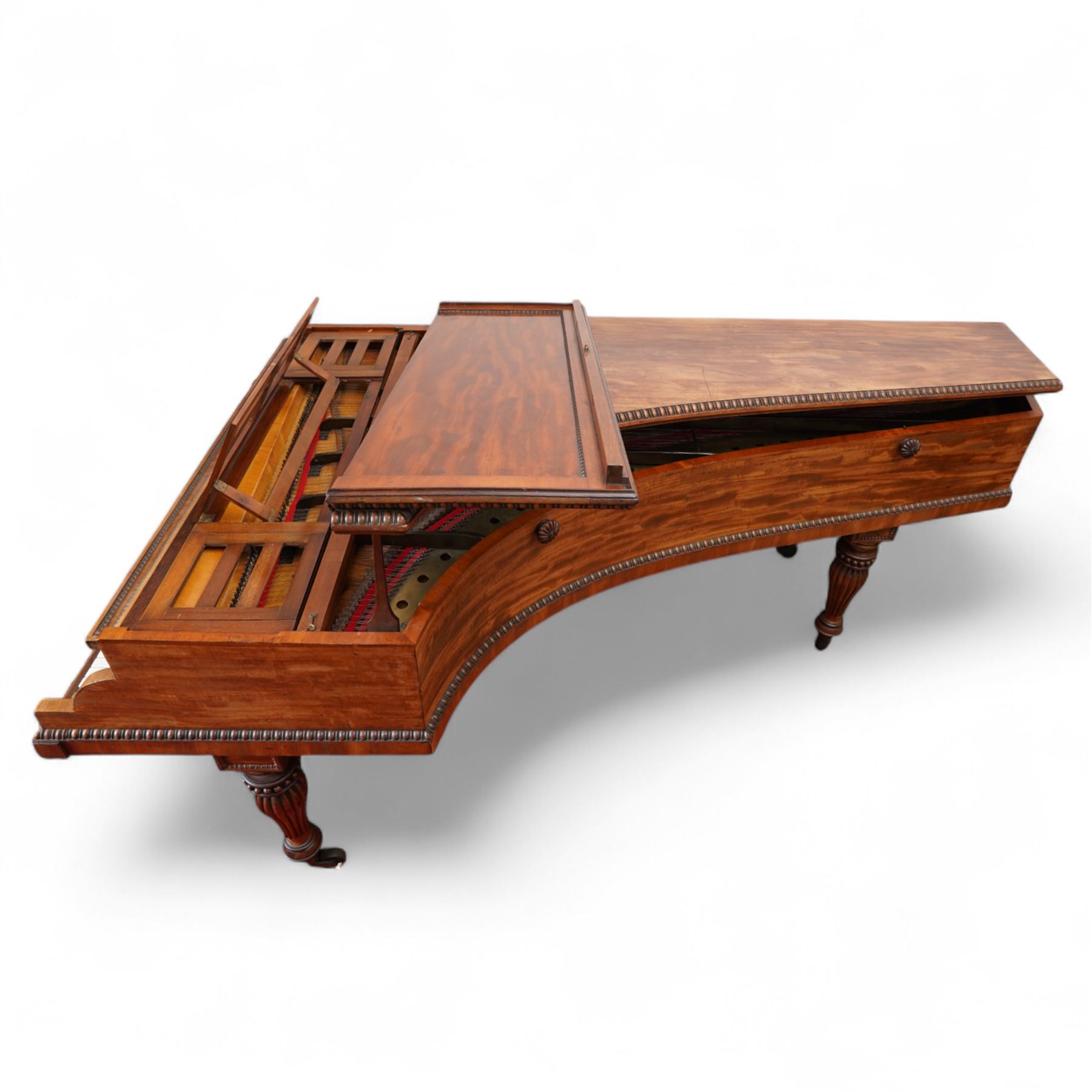 Early 19th century Grand Piano by John Broadwood & Son, London 1828.
Straight strung Broadwood “Barr Frame” Grand Piano with four steel braces from the wrest plank to the brass hitchpin plate. Partially re-strung with one string missing and some tuning pins loose, bridges in good condition, soundboard with cracks, action requires some adjustment and attention, six octave keyboard, with 73 keys C1-C7, with ivory naturals and ebony sharps, Lyre with sustain and una-chorda pedals, mahogany case with brass inlay and makers name to the double key-fall, adjustable open lattice music desk with egg and dart moulding to the surround of the case and lid, raised on reeded and tapered legs with castors. 

 You can find and listen to examples of Alan Cuckston playing this particular Broadwood Grand Piano in the links below:
Trio in D Minor Op. 25 by Francis Edward Bache
Gladiolus Rag by Scott Joplin
Sonata for Violin and Piano No.1 in G Minor by George Frederick Pinto

Given the intricate nature of these historic instruments, specialist support will be available if required, to assist successful buyers with safe removal and onward handling. Price upon application. 


This item has been registered for sale under section 10 of the APHA Ivory Act Submission Reference: 1N7BA84E
