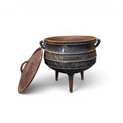Three South African cast iron graduating cooking pots with lids and handles. Size shown for the largest