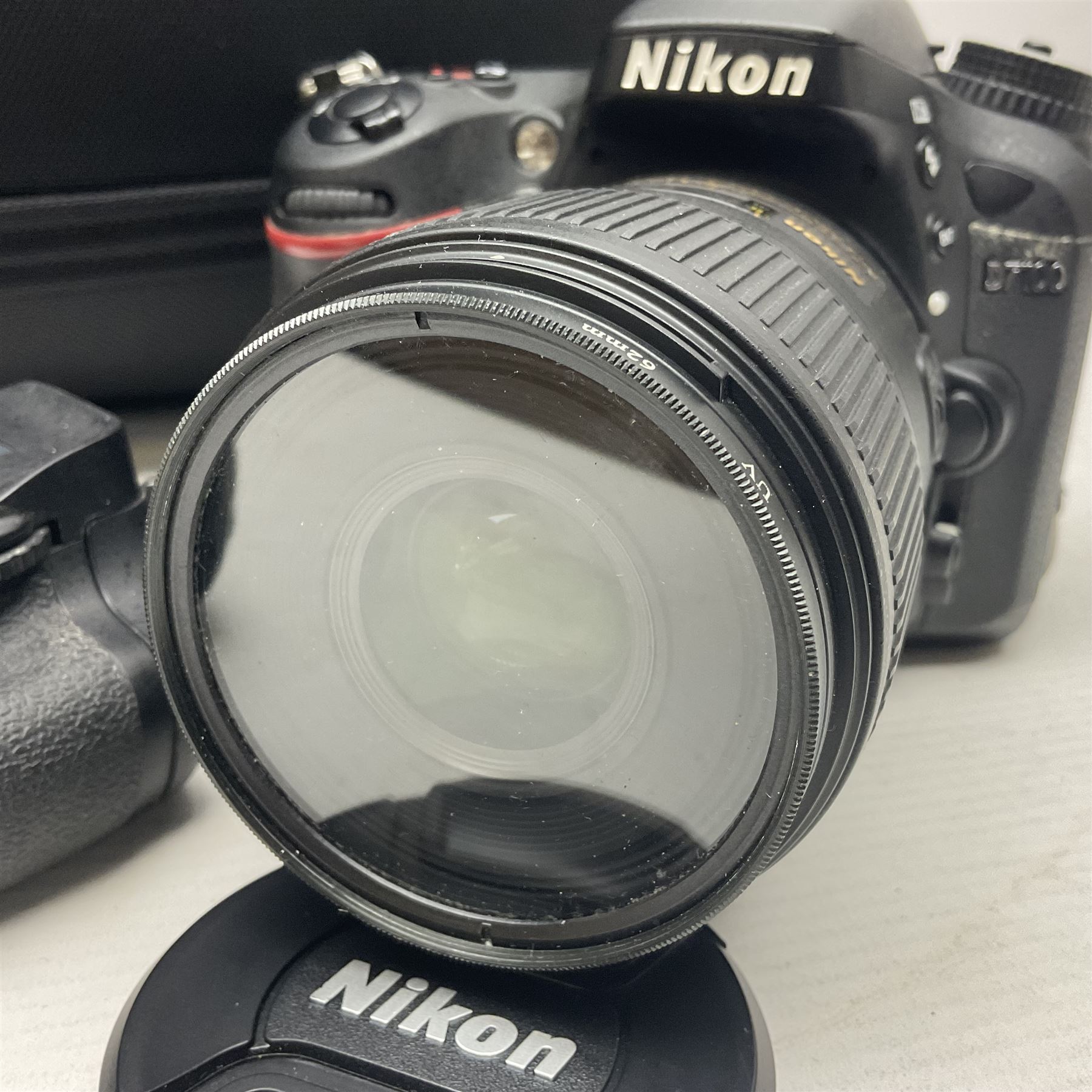Nikon D7100 camera body, serial no 4370016, with Nikon 'AF-S Micro Nikkor 60mm 1:2.8G ED' lens serial no 234883 and battery Grip HN-D7100, with Lowepro camera bag  
