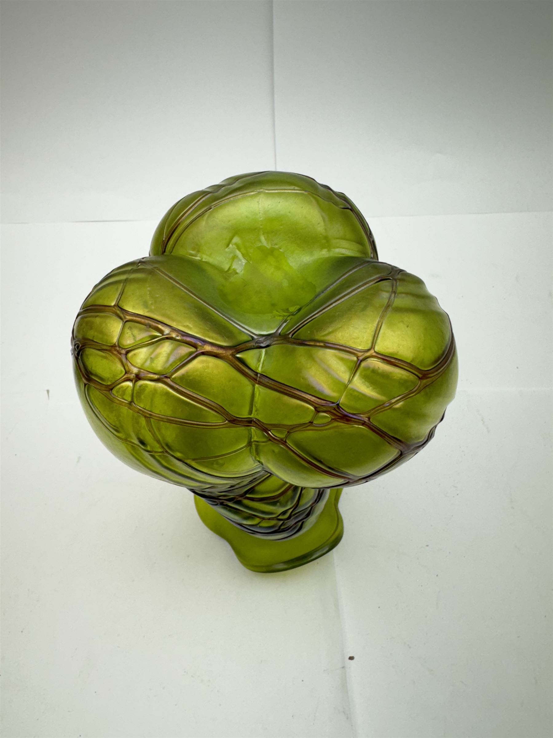 Three Austrian Art Nouveau green iridescent glass vases, to include two Pallme-Konig examples and a Kralik example, each with threaded vein decoration, tallest H25cm (3)