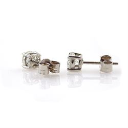 Pair of 18ct white gold round brilliant cut diamond stud earrings, hallmarked, total diamond weight approx 0.80 carat