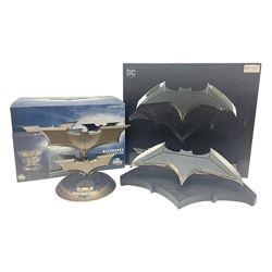 Two Batman replica Batarangs comprising DC Comics QMX Caliber Metalworks 1:1 scale replica with original box, and DC Direct The Dark Knight prop replica no. 33/1500 with original box and certificate of authenticity 