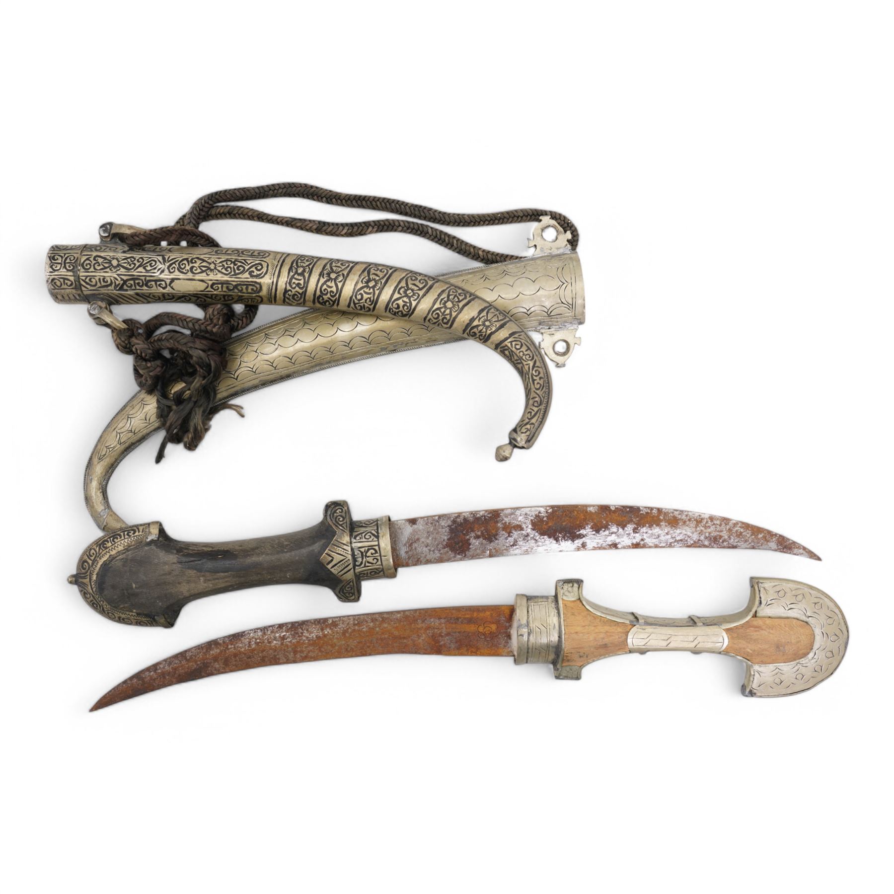 Two North African jambiya in silvered metal sheaths