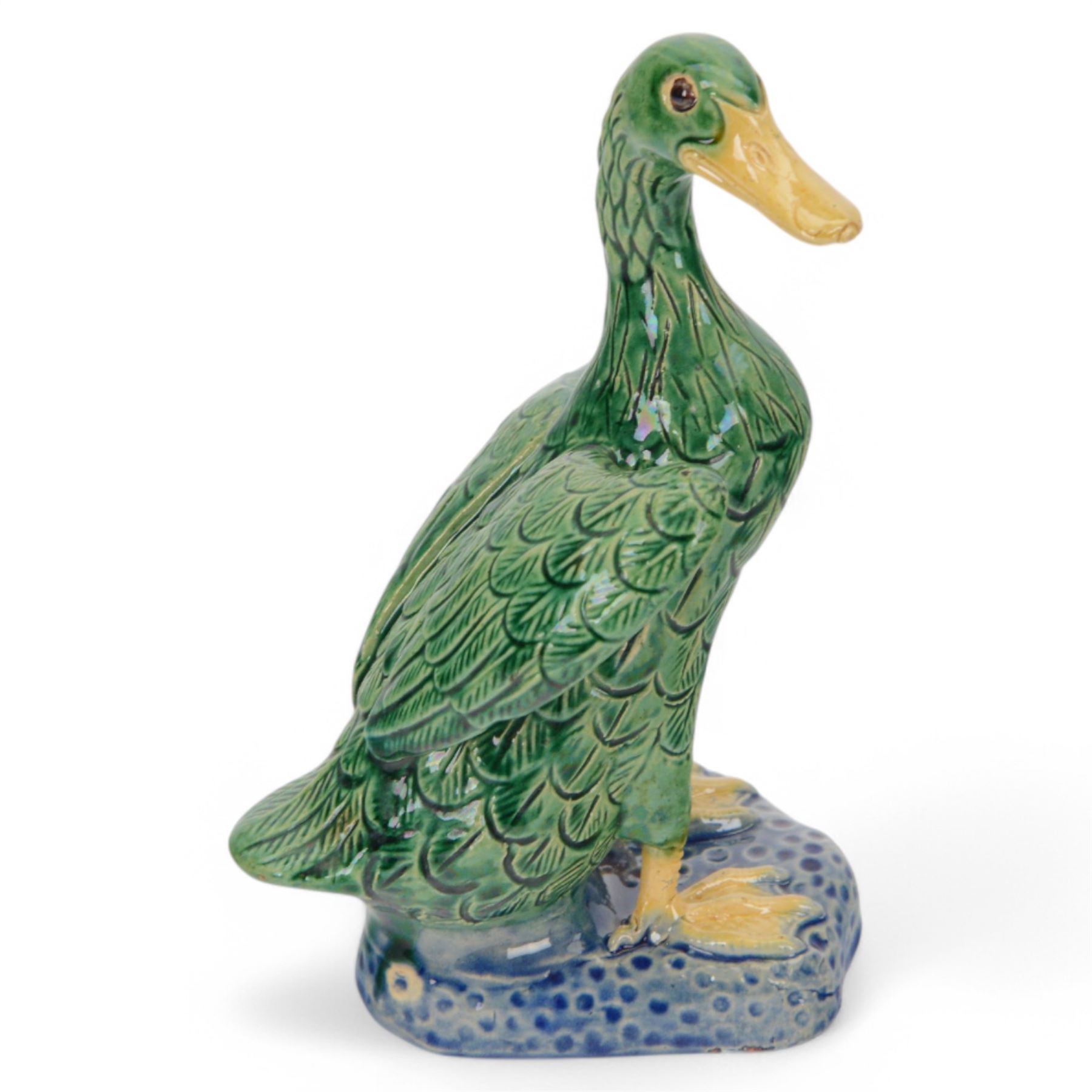 Pair of 20th century Chinese standing ducks, standing on a mottled base, H20cm