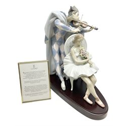 Lladro figure, Jester Serenade, modelled as a ballerina with bouquet of flowers seated before a jester playing the violin, limited edition 2541/3000, sculpted by Antonio Ramos, no 5932, with original box, year issued 1993, year retired 1994, H37cm