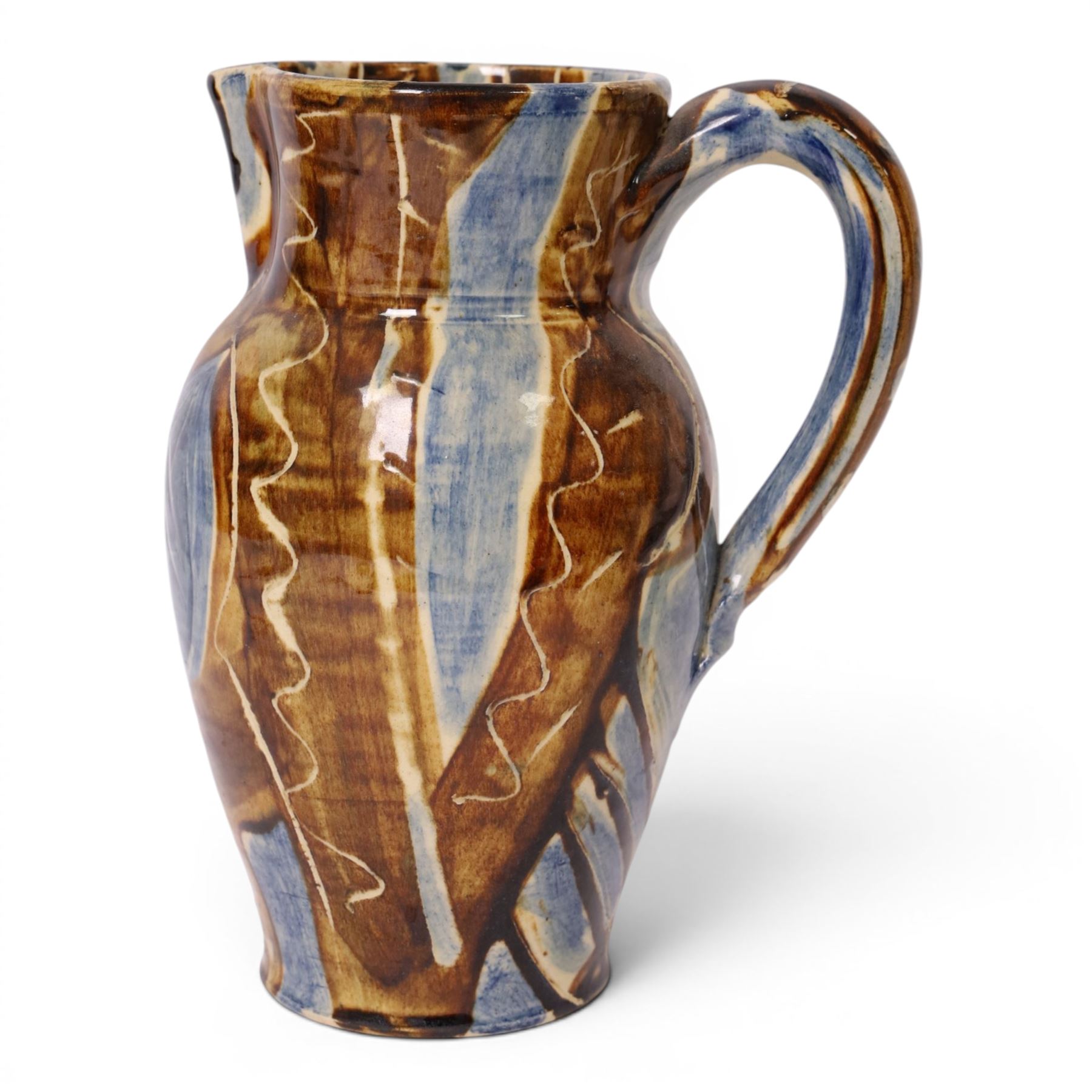 David Garland (b.1941) jug, decorated in a blue and brown glaze, with leaves and abstract patterns, H27cm